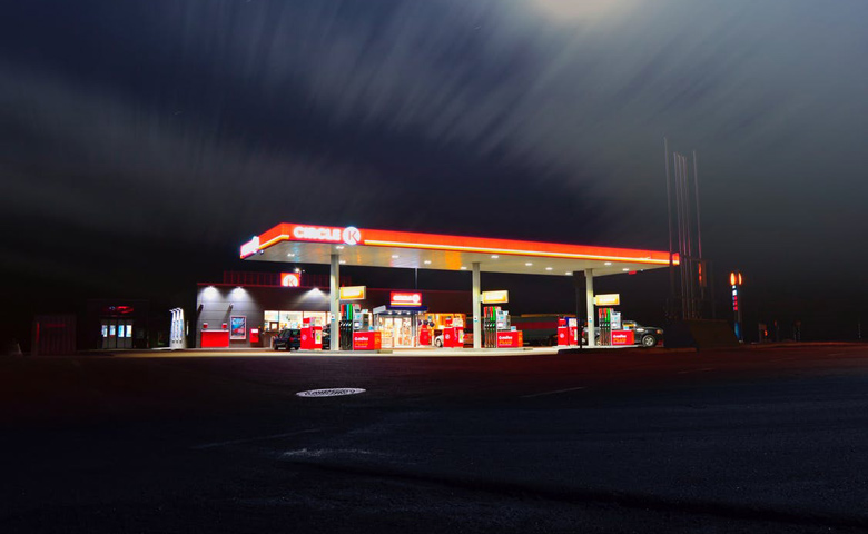 Gas station at night with bright white lights