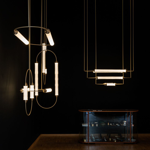 oval pendant lights suspended on thin cabling